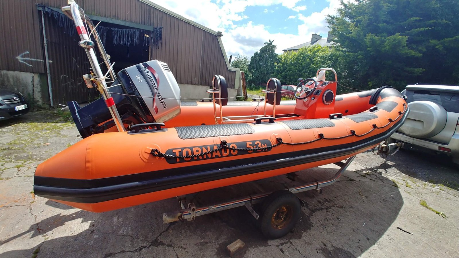 Orange Tornado RIB photographed at NEWMARINE